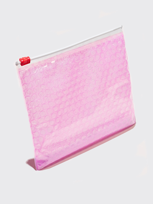 3 pink pouches, Glossier