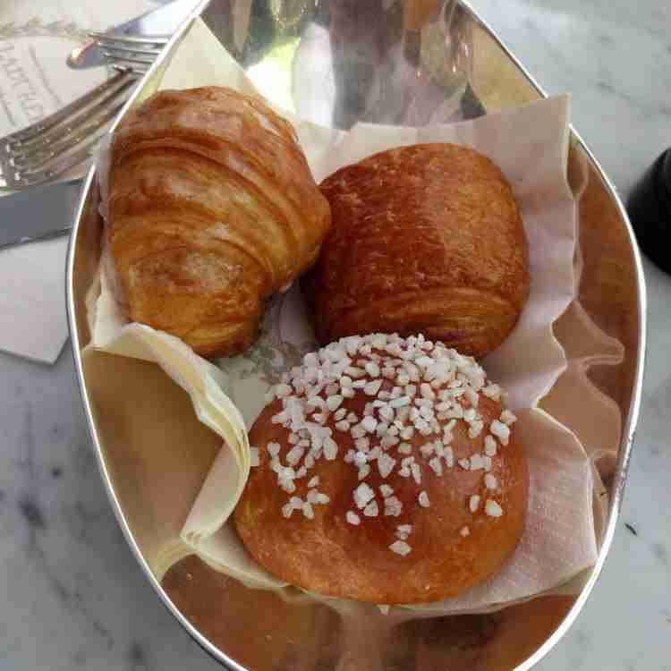 Assorted bread rolls with jam , honey & butter