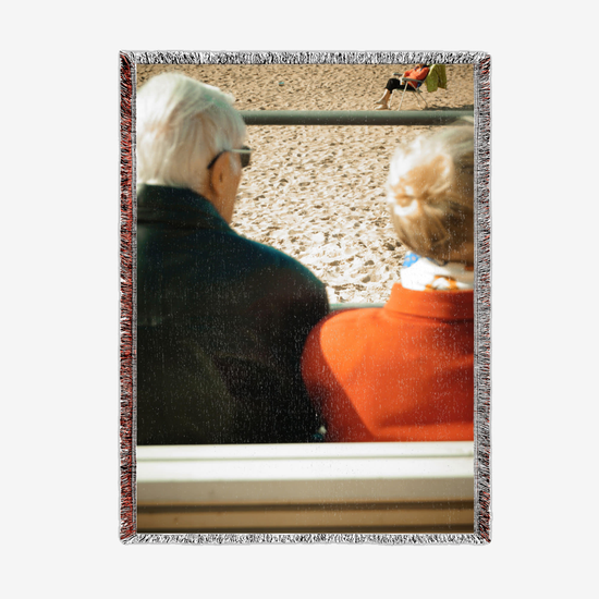 Blanket beach talk couple