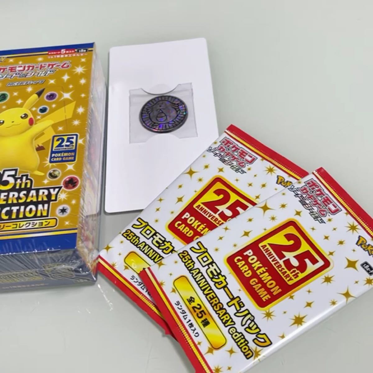 25th anniversary collection of Pokemon card games with promo coins